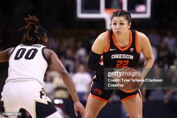 Talia von Oelhoffen of the Oregon State Beavers looks to pass around Jaylyn Sherrod of the Colorado Buffaloes in the first half at the CU Events...