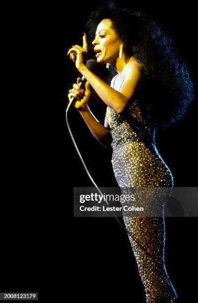 American singer Diana Ross sings on stage during a concert at the Universal Amphitheatre in Universal City, California, circa 1990.