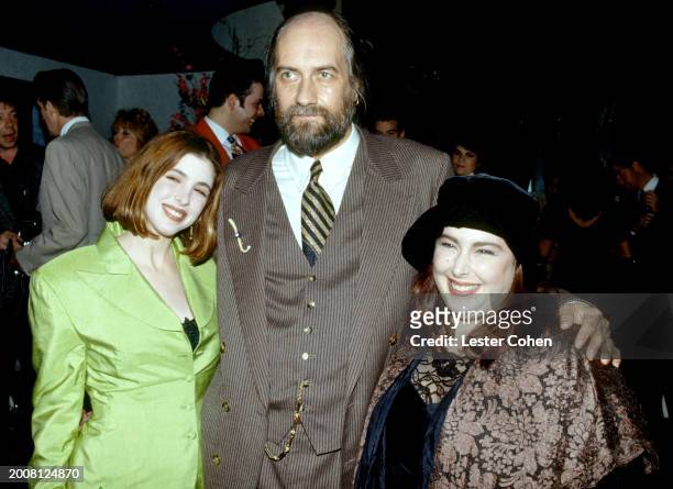 American singers Wendy Wilson and Carnie Wilson, of the American pop group Wilson Phillips, pose for a portrait with drummer Mick Fleetwood, of the...