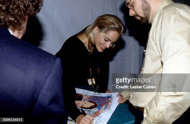 American actress Sharon Stone signs autographs while attending HBO's 'Comic Relief V' to Benefit America's Homeless at Universal Amphitheatre in...