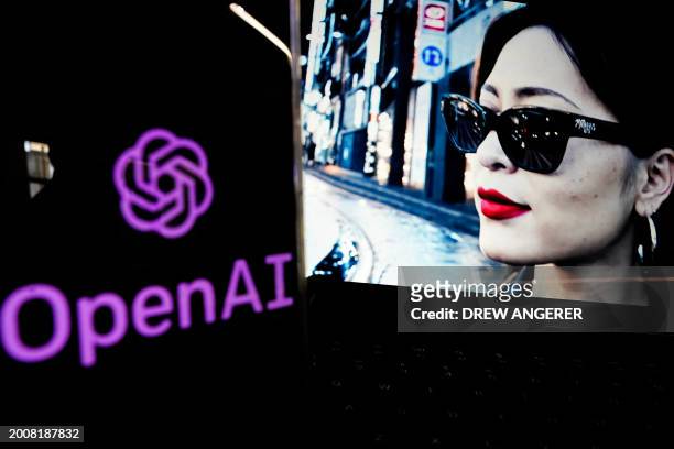 In this photo illustration, a video created by Open AI's newly released text-to-video "Sora" tool plays on a monitor in Washington, DC on February...
