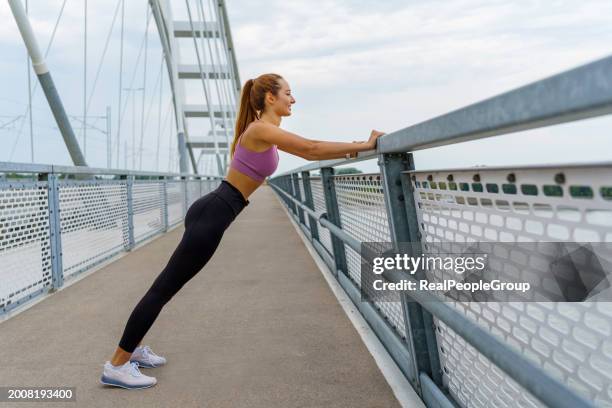 elevating wellness above the water - fitness or vitality or sport and women stock pictures, royalty-free photos & images