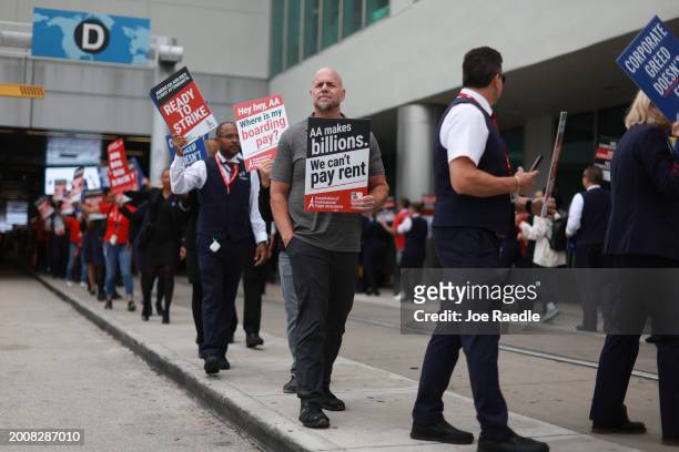 Flight attendants make their voices heard during the Worldwide Flight Attendant Day of Action at the Miami International Airport on February 13, 2024...