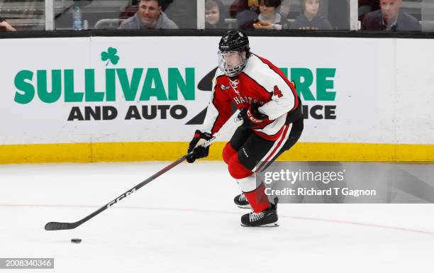 Pito Walton of the Northeastern Huskies skates against the Boston University Terriers during the third period during NCAA mens hockey in the...