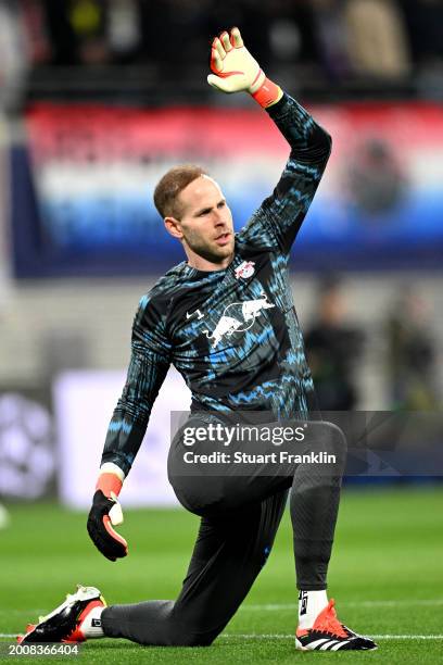 Peter Gulacsi of RB Leipzig warms up ahead of the UEFA Champions League 2023/24 round of 16 first leg match between RB Leipzig and Real Madrid CF at...