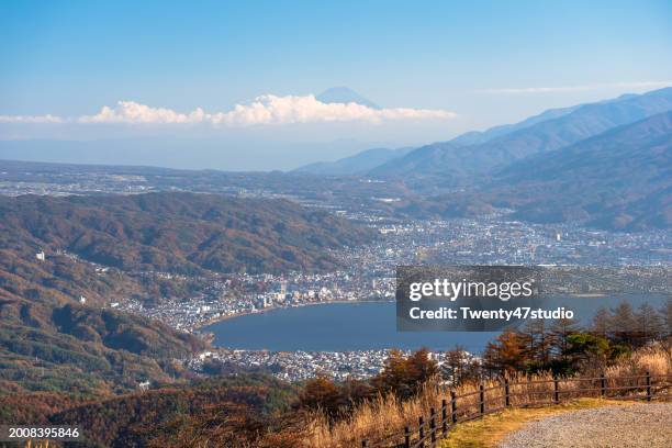 beautiful scenery of lake suwa and mount fuji from nagano, japan - chino stock pictures, royalty-free photos & images