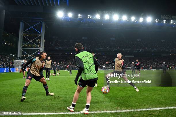 The players of Manchester City warm up prior to the UEFA Champions League 2023/24 round of 16 first leg match between F.C. Copenhagen and Manchester...