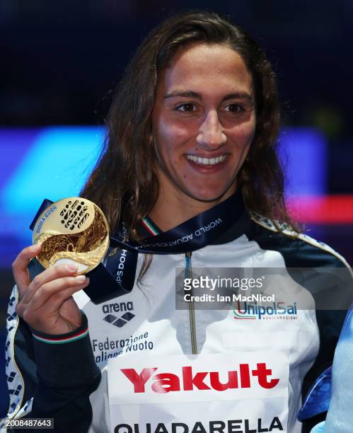 Simona Quadarella of Italy poses with her gold medal from the Women's 1500m Freestyle final on day twelve of the Doha 2024 World Aquatics...
