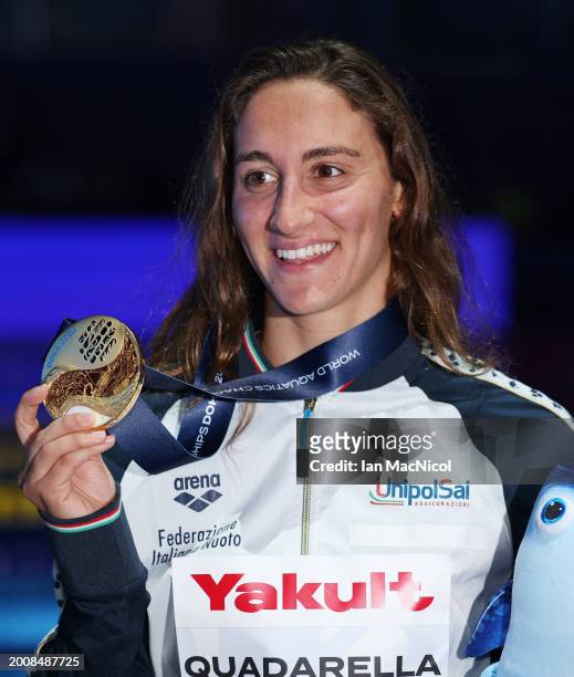 Simona Quadarella of Italy poses with her gold medal from the Women's 1500m Freestyle final on day twelve of the Doha 2024 World Aquatics...