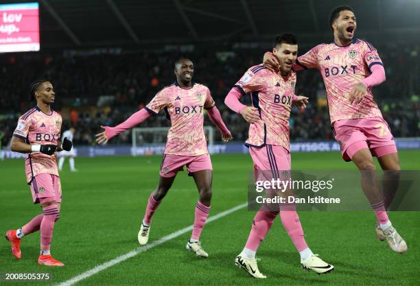 Joel Piroe of Leeds United celebrates scoring his team's second goal with teammate Georginio Rutter during the Sky Bet Championship match between...