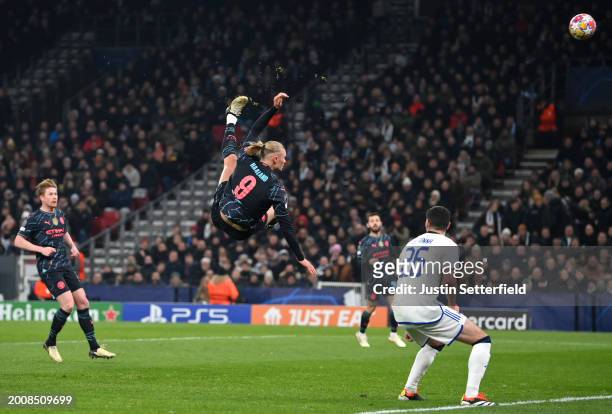 Erling Haaland of Manchester City takes an acrobatic shot during the UEFA Champions League 2023/24 round of 16 first leg match between F.C....