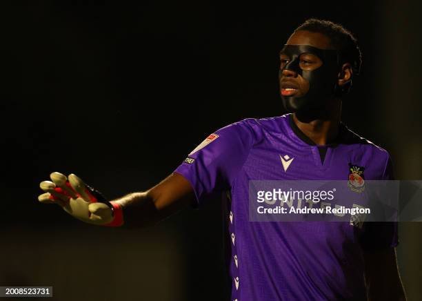 Arthur Okonkwo of Wrexham is pictured wearing a protective face mask during the Sky Bet League Two match between Sutton United and Wrexham at VBS...