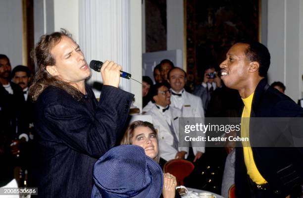 American singer Michael Bolton, American actress Brooke Shields and American singer Jeffrey Osborne attend the 33rd Annual Grammy Awards Pre-Party...