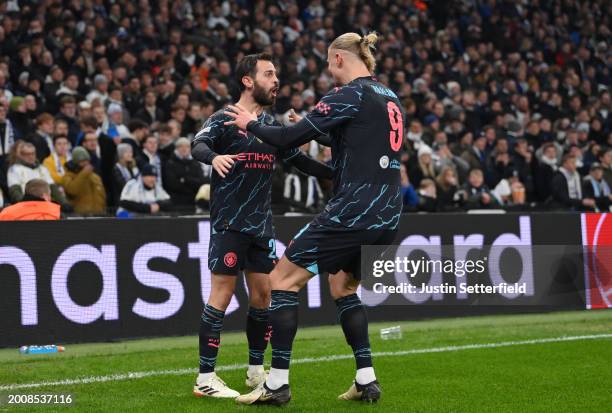 Bernardo Silva of Manchester City celebrates with Erling Haaland of Manchester City after scoring his team's second goal during the UEFA Champions...