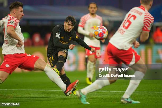 Brahim Díaz of Real Madrid scores the teams first goal during the UEFA Champions League 2023/24 round of 16 first leg match between RB Leipzig and...