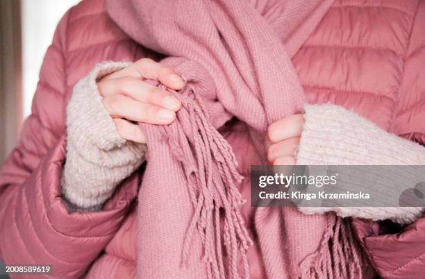 scarf - pink coat stock pictures, royalty-free photos & images