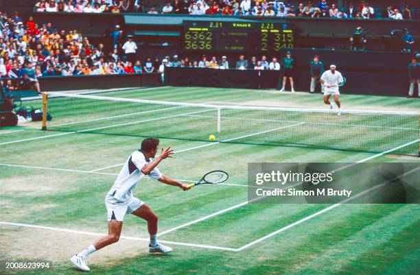 Goran Ivanisevic of Croatia in action during the Men's Singles Final against Patrick Rafter of Australia at The Wimbledon Lawn Tennis Championship at...