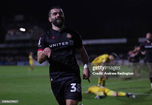 Elliot Lee of Wrexham celebrates after scoring his side's second goal during the Sky Bet League Two match between Sutton United and Wrexham at VBS...