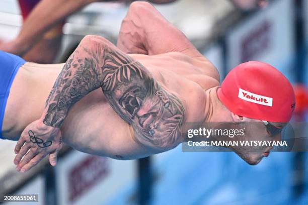 Britain's Matthew Richards prepares to compete in the final of the men's 4X200m freestyle relay swimming event during the 2024 World Aquatics...