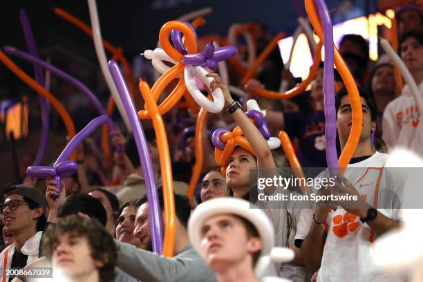 Clemson fans in the stand during a college basketball game between the Miami Hurricanes and the Clemson Tigers on February 14, 2024 at Littlejohn...