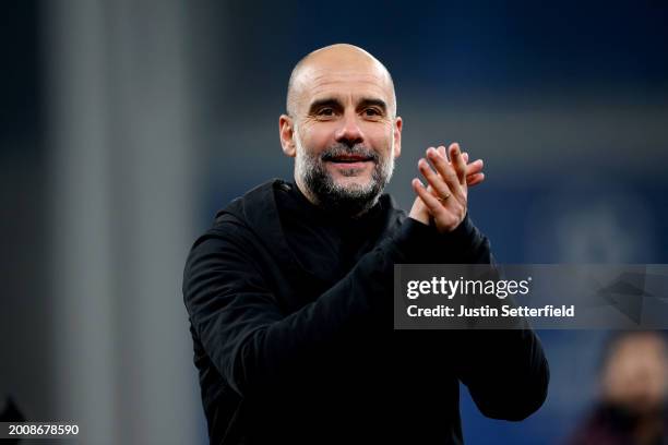 Pep Guardiola, Manager of Manchester City, applauds the fans at full-time following the team's victory in the UEFA Champions League 2023/24 round of...