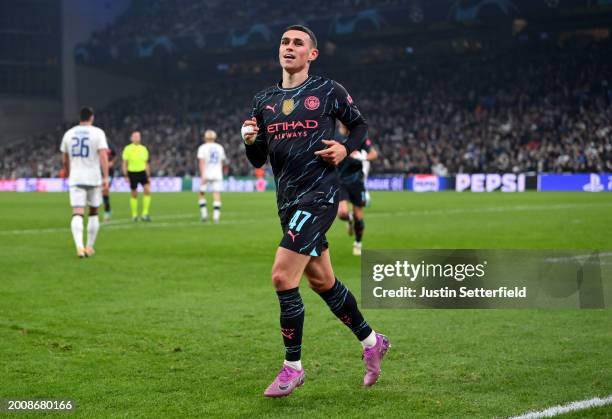 Phil Foden of Manchester City celebrates scoring his team's third goal during the UEFA Champions League 2023/24 round of 16 first leg match between...