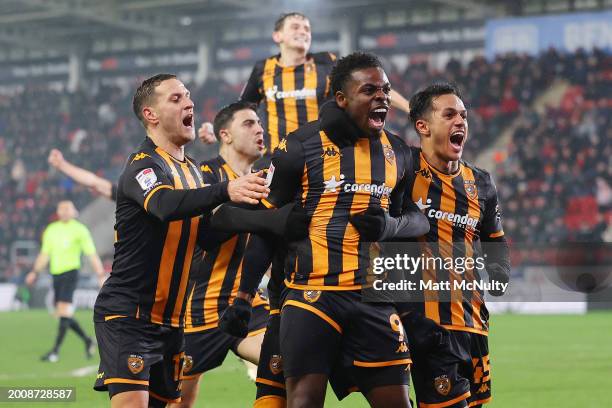 Noah Ohio of Hull City celebrates with teammates after scoring his team's second goal during the Sky Bet Championship match between Rotherham United...