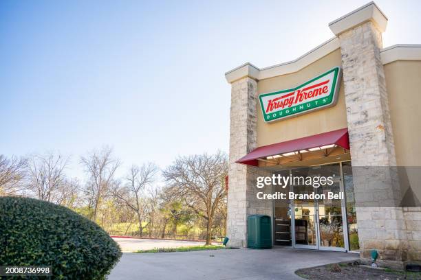 The exterior of a Krispy Kreme store is seen on February 13, 2024 in Austin, Texas. Krispy Kreme Inc. Today announced expected double-digit price...