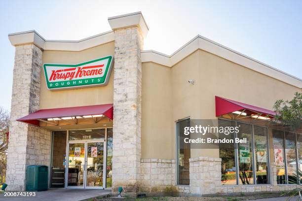 The exterior of a Krispy Kreme store is seen on February 13, 2024 in Austin, Texas. Krispy Kreme Inc. Today announced expected double-digit price...