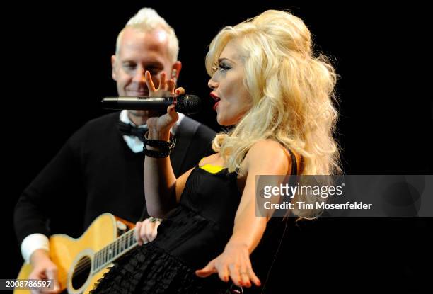 Tom Dumont and Gwen Stefani of No Doubt perform during Neil Young's 23rd Annual Bridge Benefit at Shoreline Amphitheatre on October 24, 2009 in...