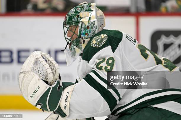 Marc-Andre Fleury of the Minnesota Wild wears a special jersey during warm ups commemorating his 552 career wins and 1,000 career games played before...