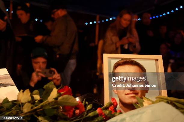 People leave flowers during a vigil for Alexiei Navalny in front of the Russian Consulate General on February 16, 2024 in Munich, Germany. The death...