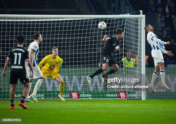 February 2024, Berlin: Soccer: Bundesliga 2, Hertha BSC - 1. FC Magdeburg, Matchday 22, Olympiastadion, Magdeburg's Tobias Müller heads in the...