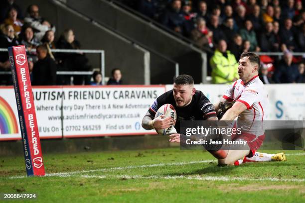 Robbie Storey of London Broncos scores his team's first try during the Betfred Super League match between St Helens and London Broncos at Totally...