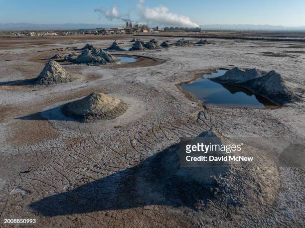 In an aerial view, mud pots, or fumaroles, and mud volcanoes are seen near the Hudson Ranch geothermal power plant on February 14, 2024 near Niland,...