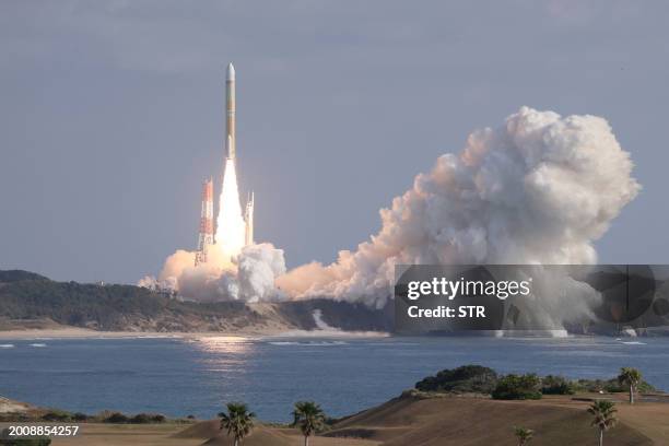 Japan's H3 rocket leaves the launch pad at the Tanegashima Space Center in Kagoshima, southwestern Japan on February 17, 2024. Japan's space agency...