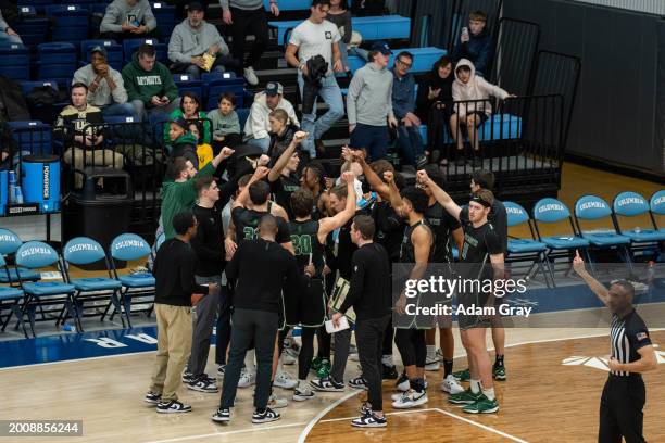 Dartmouth Big Green players huddle during their game against Columbia Lions in their NCAA men's basketball game on February 16, 2024 in New York...