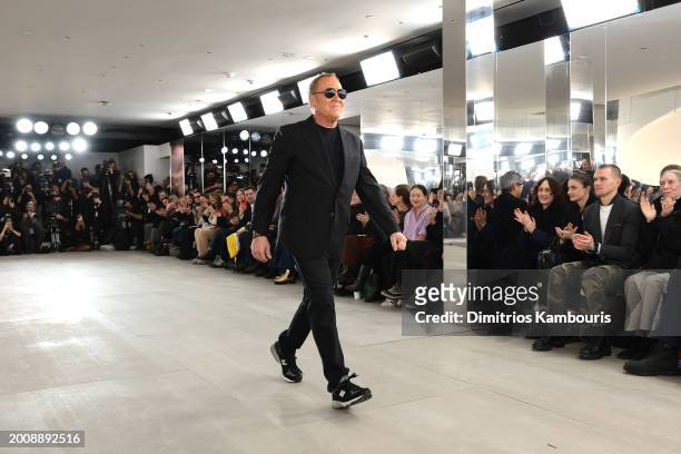 Designer Michael Kors walks the runway finale during the Michael Kors Collection Fall/Winter 2024 Runway Show on February 13, 2024 in New York City.
