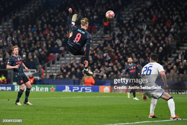 Erling Haaland of Manchester City takes an acrobatic shot during the UEFA Champions League 2023/24 round of 16 first leg match between F.C....