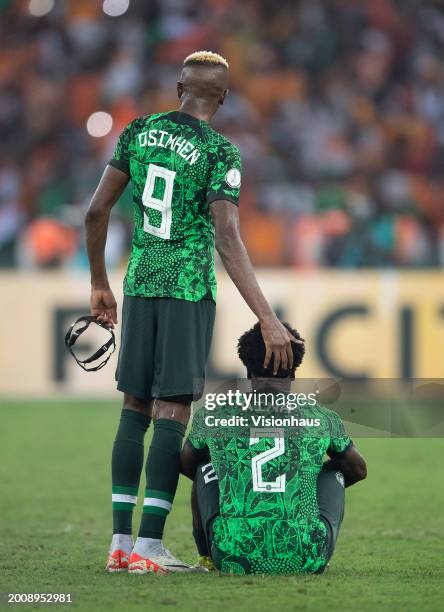 Victor Osimhen and Ola Aina of Nigeria react to defeat after the TotalEnergies CAF Africa Cup of Nations final match between Nigeria and Ivory Coast...