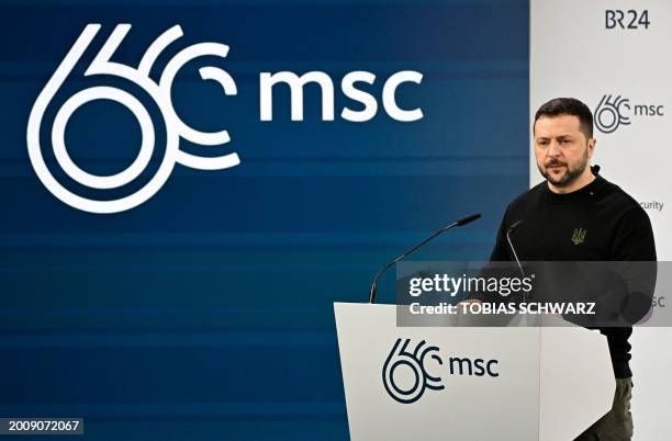 Ukrainian President Volodymyr Zelensky delivers his speech at the 60th Munich Security Conference at the Bayerischer Hof hotel in Munich, southern...