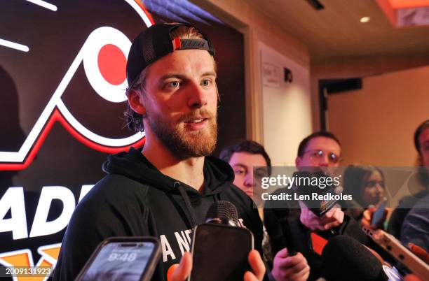 Samuel Ersson of the Philadelphia Flyers speaks to members of the media in the locker room after defeating the Winnipeg Jets 4-1 at the Wells Fargo...