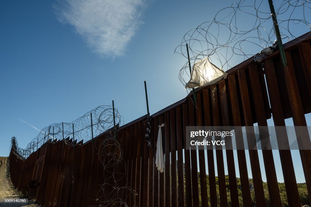 Migrants At The US-Mexico Border