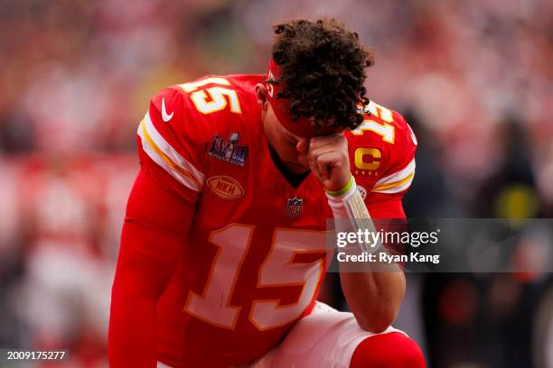 Patrick Mahomes of the Kansas City Chiefs prays in the end zone before Super Bowl LVIII against the San Francisco 49ers at Allegiant Stadium on...