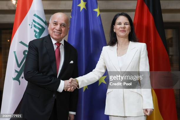 Iraqi Foreign Minister Fuad Hussein and German Foreign Minister Annalena Baerbock pose for media on the occasion of bilateral talks at the...