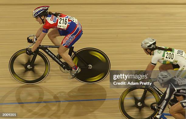 Victoria Pendleton of Great Britain makes her move to go past Rochelle Gilmore of Australia and Sarah Ulmer of New Zealand to claim the Gold in the...