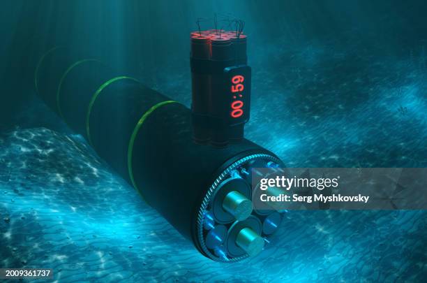 concept of sabotage on underwater internet communication cables. explosives with a timer on an underwater internet cable. - undersea warfare stock pictures, royalty-free photos & images