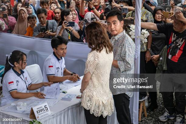 Vice presidential candidate Gibran Rakabuming Raka, Indonesian President Joko Widodo's eldest son and current Surakarta City mayor, and his wife...