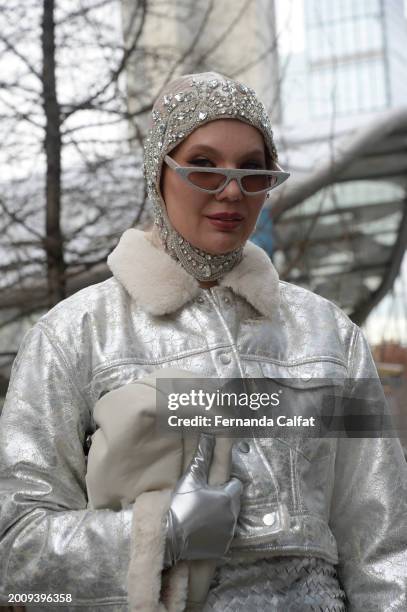 Annie Estrin wears Fashion Nova jacket, Bottega Veneta skirt, Steve Madden shoes, Max Mara bag and Balmain hat during New York Fashion Week : The...