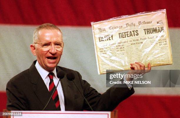 Independent presidential candidate Ross Perot holds up a copy of the famous Chicago Daily Tribune front page declaring Thomas Dewey the winner over...